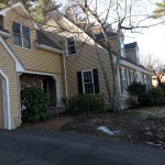 tan colored vinyl siding home