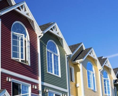 Townhouses with different colored vinyl siding