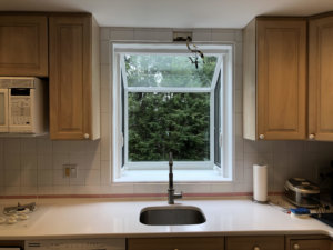 Old garden window over kitchen sink