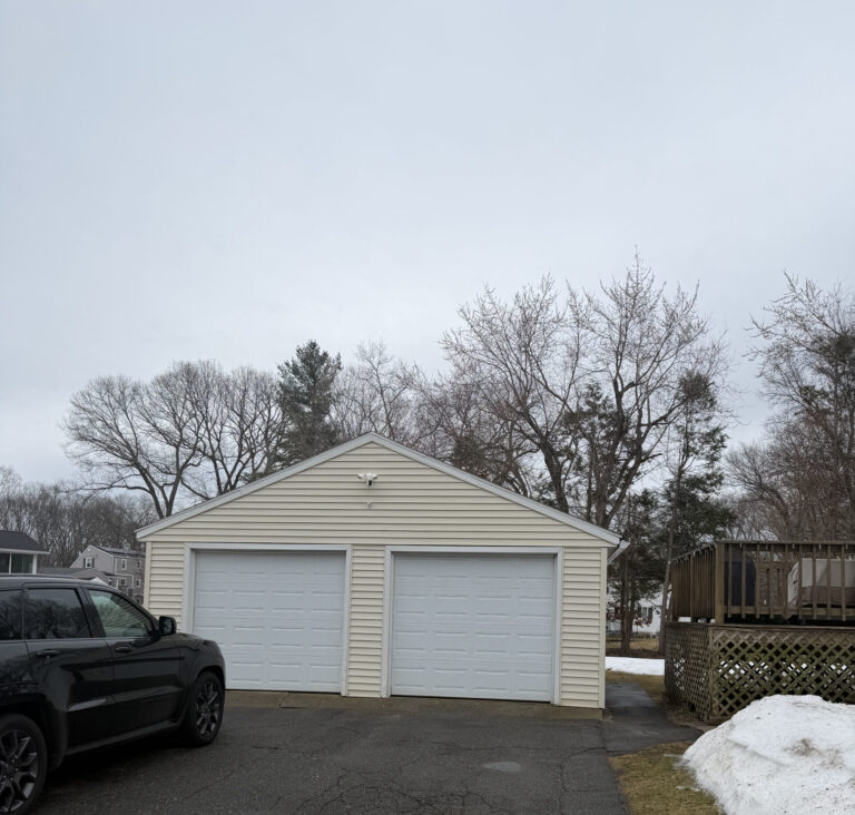 view from driveway of newly installed garage doors