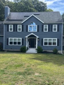 exterior of two story house blue vinyl siding