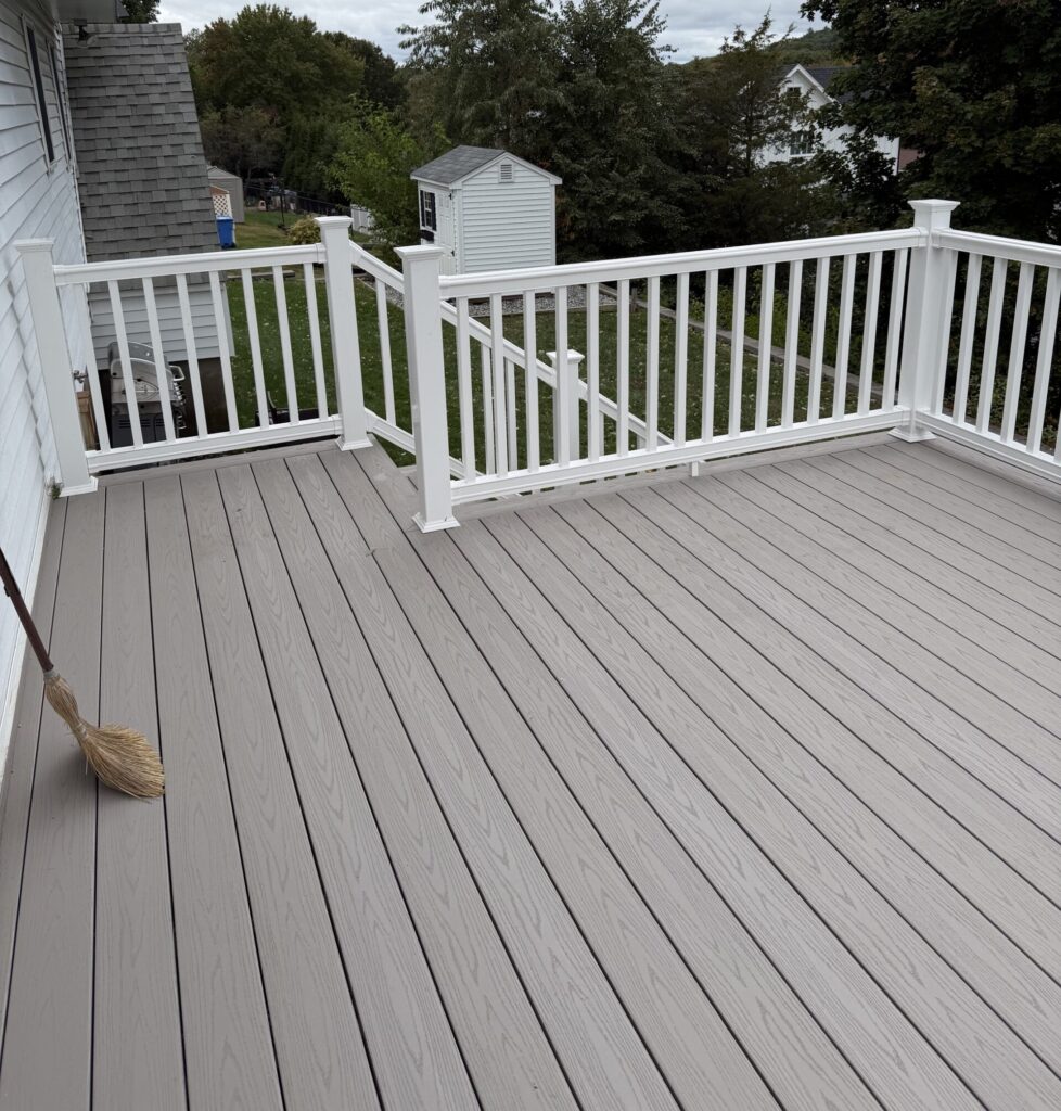 newly installed grey deck in Waltham MA